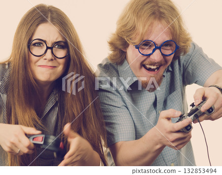Gaming couple playing games Gaming couple playing games 132853494