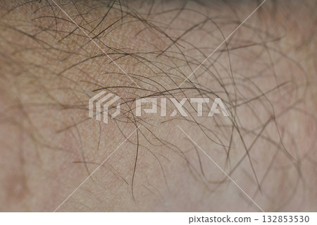Detailed look at fine hair on human skin surface 132853530