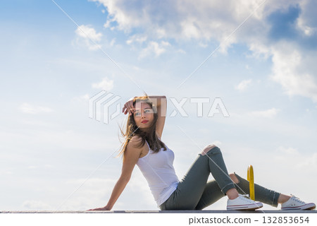 Girl casual clothing relaxing outdoor Girl casual clothing relaxing outdoor 132853654