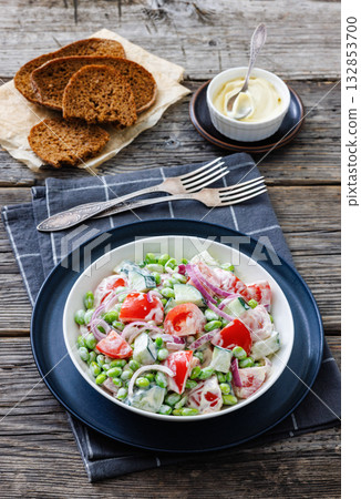 creamy tomato cucumber edamame bean onion salad 132853700