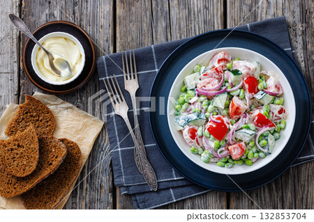 creamy tomato cucumber edamame bean onion salad creamy tomato cucumber edamame bean onion salad 132853704