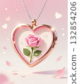 Heart shaped locket with pink rose inside. 132854206