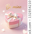 Pink heart gift box with bow and Be mine text. 132854210