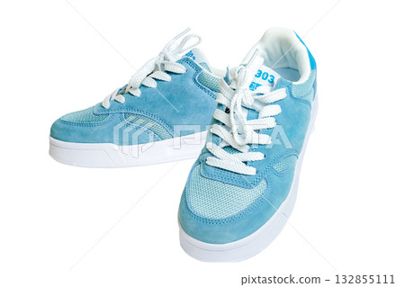 Blue sneakers on a white isolate background Blue sneakers on a white isolate background 132855111