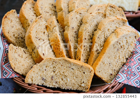 Whole Grain Healthy Sandwich Bread Square Slices, Supermarket Bread for Toasts, Soft Sandwich Loaf Pieces on wooden Background Top View, Clipping Path. wheat bread 132855443