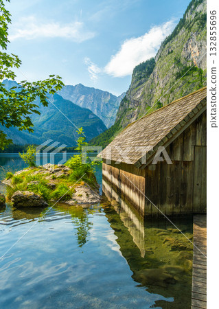 Obersee Lake, Fischunkelalm Wooden Cabin and Mountains. Bavaria, Germany Obersee Lake, Fischunkelalm Wooden Cabin and Mountains. Bavaria, Germany 132855696