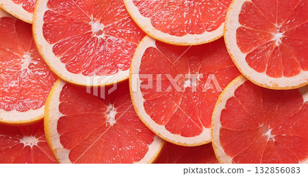 closeup of ripe juicy red grapefruit fruit slices 132856083