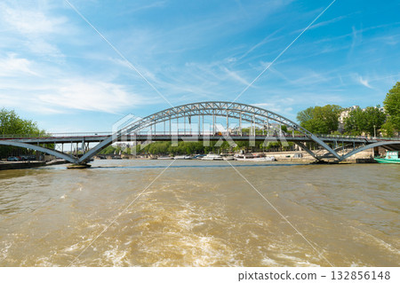 Panoramic view of the Passerelle Debilly pedestrian bridge spanning the River Seine in Paris, France. Panoramic view of the Passerelle Debilly pedestrian bridge spanning the River Seine in Paris, France. 132856148