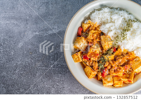 Mapo Tofu Rice Bowl (Mapo Doufu Fan), a popular and spicy Chinese dish from Sichuan province. Mapo Tofu Rice Bowl (Mapo Doufu Fan), a popular and spicy Chinese dish from Sichuan province. 132857512