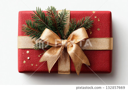 Premium gift box. Christmas Gift Box with a sprig of pine on white background. Christmas traditions and seasonal joy. 132857669