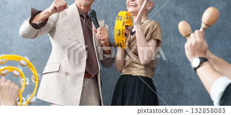 Elderly people singing enthusiastically at karaoke Elderly people singing enthusiastically at karaoke 132858083