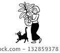 A woman carrying a houseplant 132859378