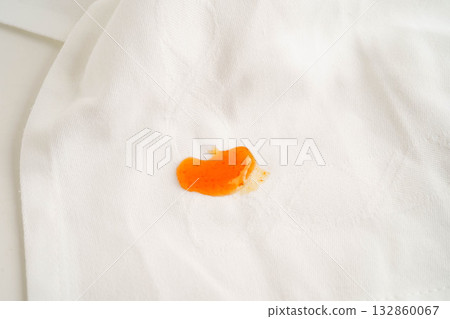 Dirty tomato sauce stain removal or ketchup on cloth accident to wash with washing powder, cleaning housework. Dirty tomato sauce stain removal or ketchup on cloth accident to wash with washing powder, cleaning housework. 132860067