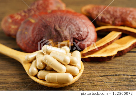 Lingzhi or Reishi mushroom with capsules, organic natural healthy food. 132860072
