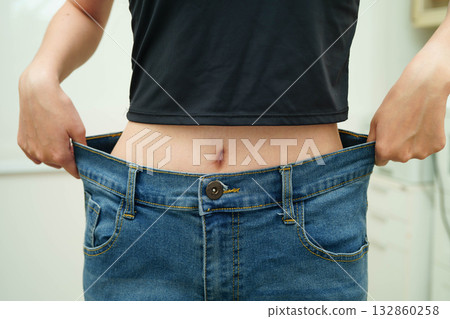 Asian woman with cellulite on leg skin fat, overweight problem. 132860258