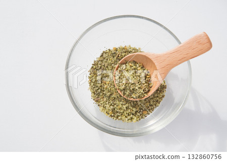 Herb salt in a glass container 132860756
