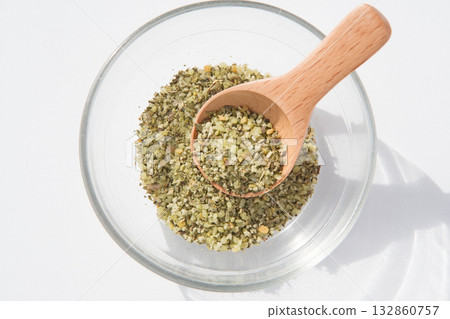 Herb salt in a glass container 132860757
