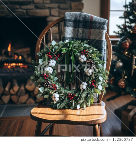 A wreath leaning against an antique chair 132860787