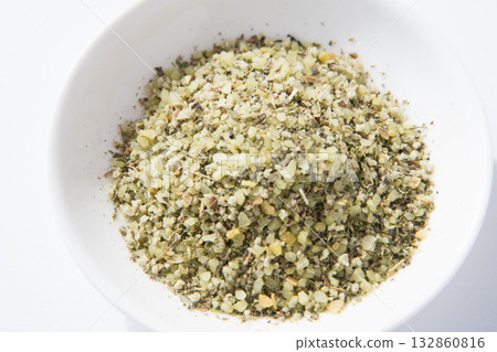 Herb salt in a white dish Herb salt in a white dish 132860816