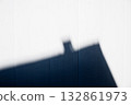 Abstract shadow of a building on a white wall 132861973