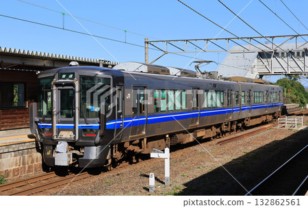 Hokuriku Main Line 521 series local train stopping at Torahime Station 132862561