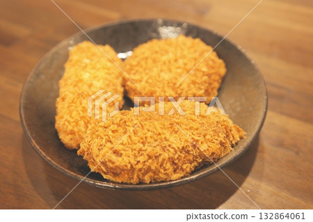 A delicious plate of crispy croquettes 132864061