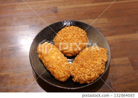 A delicious plate of crispy croquettes A delicious plate of crispy croquettes 132864085