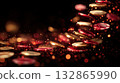 Golden and red coins appear mid air with sparkling lights, creating a magical and festive abstract holiday background or New Year vibe.  132865990