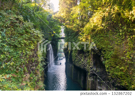 Boats sailing to Manai waterfall of Takachiho gorge at sunrise, Miyazaki 132867202