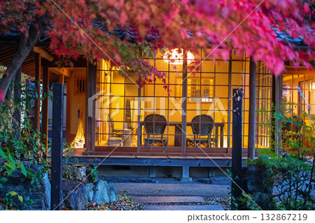Japanese cafe interior light up with red maple leaf, Uji, Kyoto 132867219
