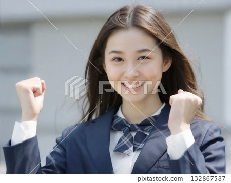 Smiling high school girl pumping her fist Generative AI 132867587