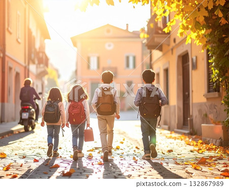 Back to schools Italian children with colorful backpacks walking on a cobblestone street 132867989