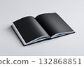 Open book with blank black pages ready for creative expression and note-taking 132868851