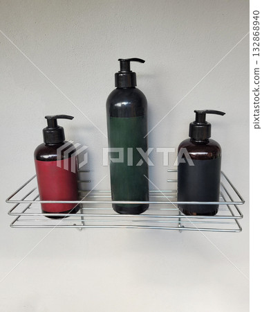 Bottles with Dispensers on Wire Shelf Bottles with Dispensers on Wire Shelf 132868940