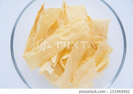 Dried yuba in a glass dish 132868982