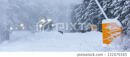 Snow groomer ratrack machine, ski slope, banner 132870383