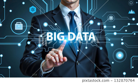 Businessman touching digital big data interface representing analytics and technology innovation. Businessman touching digital big data interface representing analytics and technology innovation. 132870764