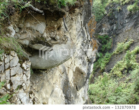 of clear water from the high mountains continues its movement over the rocks like a mountain stream. of clear water from the high mountains continues its movement over the rocks like a mountain stream. 132870978