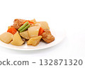 Boiled root vegetables: daikon radish, carrots, and fish cakes on a light background 132871320