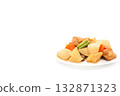 Boiled root vegetables: daikon radish, carrots, and fish cakes on a light background 132871323