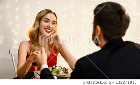 Absolutely In Love. Affectionate Woman Looking At Her Boyfriend With Adorance On Romantic Date In Restaurant, Selective Focus Absolutely In Love. Affectionate Woman Looking At Her Boyfriend With Adorance On Romantic Date In Restaurant, Selective Focus 132871913