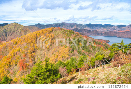 Nikko City, Tochigi Prefecture: Mount Chuzenji and Mount Shazan dyed in autumn leaves 132872454