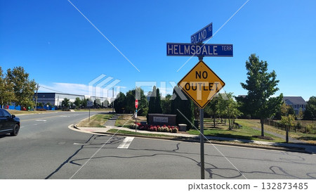Chantilly, Virginia, USA - 10.25.2025: The warning sign, which indicates that the road has no through passage and the intersection of two streets, is located at the intersection on a sunny day 132873485