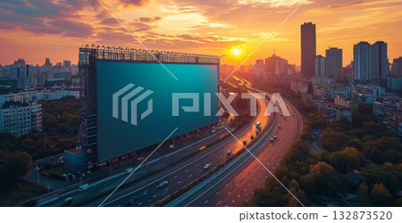 A massive billboard prominently displayed on the side of a busy highway, capturing the attention of passing motorists. A massive billboard prominently displayed on the side of a busy highway, capturing the attention of passing motorists. 132873520