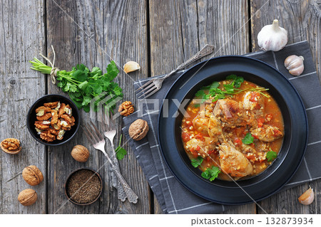 Chakhokhbili, Georgian chicken stew in a bowl 132873934