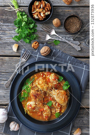 Chakhokhbili, Georgian chicken stew in a bowl Chakhokhbili, Georgian chicken stew in a bowl 132873936