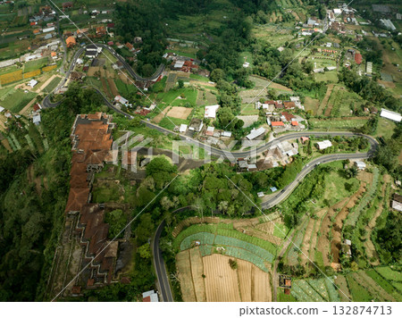 Curved mountain road serpentine in Bali, Indonesia 132874713