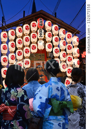 Walking at dusk on Shinmachi Street during the Gion Festival in Kyoto, Yoiyoyama 132875558