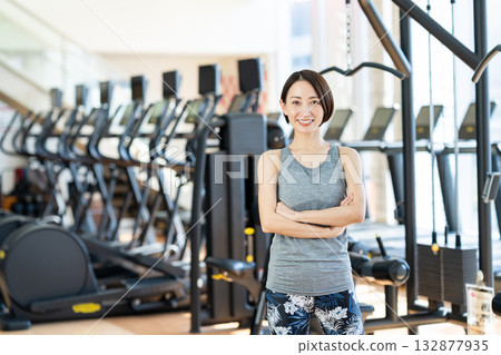 A middle-aged woman training at the gym. Photo courtesy of Sports Club & Sauna Spa Renaissance Makuhari 24 A middle-aged woman training at the gym. Photo courtesy of Sports Club & Sauna Spa Renaissance Makuhari 24 132877935