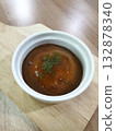 Mashed Potato in white bowl on old wooden plate. 132878340